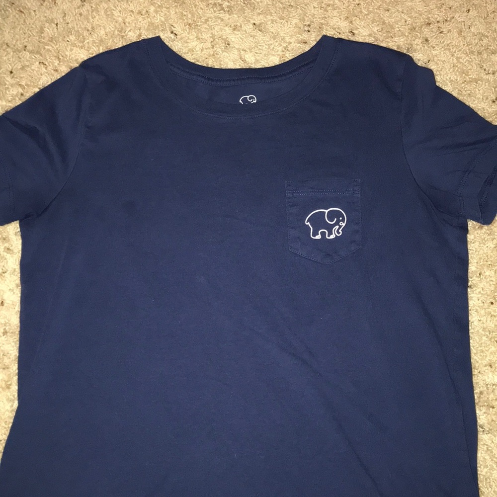 two ivory Ella shirts